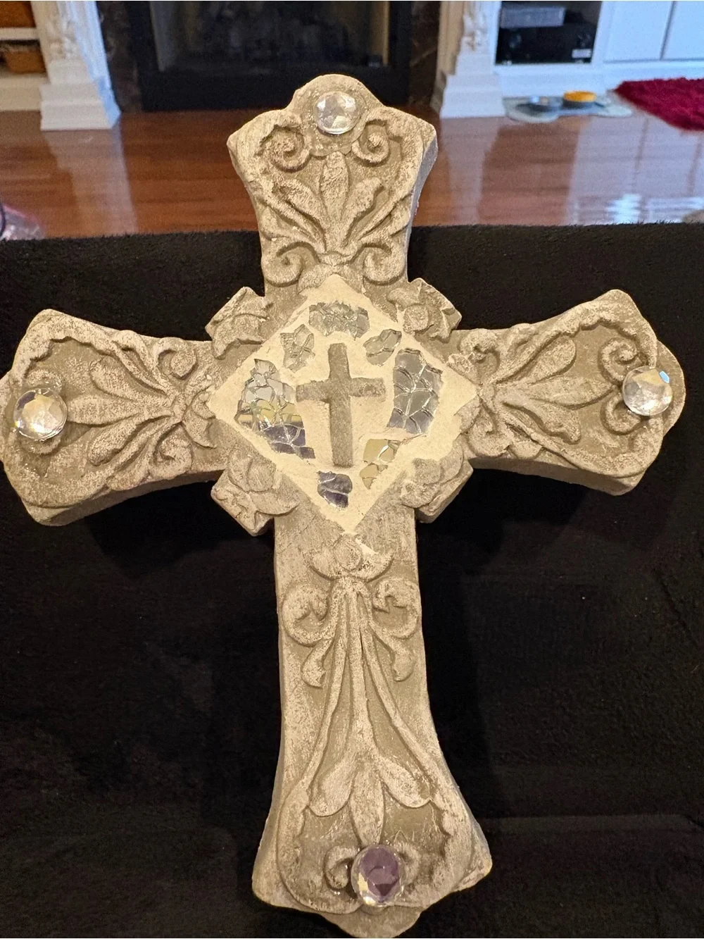 Ornate grey stone-look wall cross